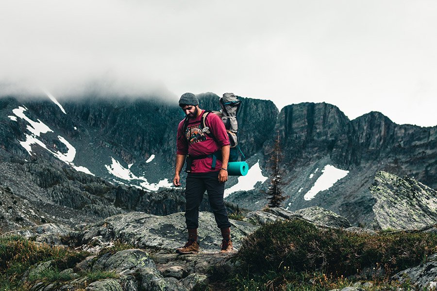 Man hiking alone in the mountains