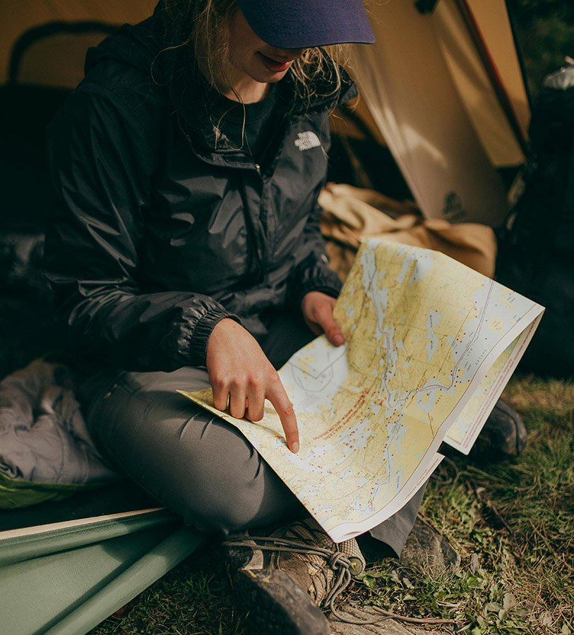 Camper looking at a map