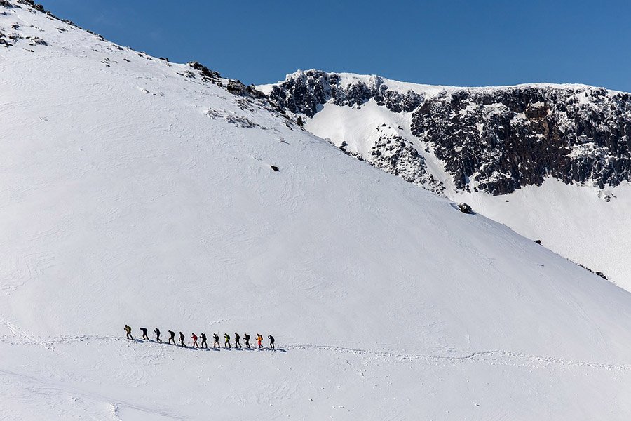 Hiking in snowy mountains