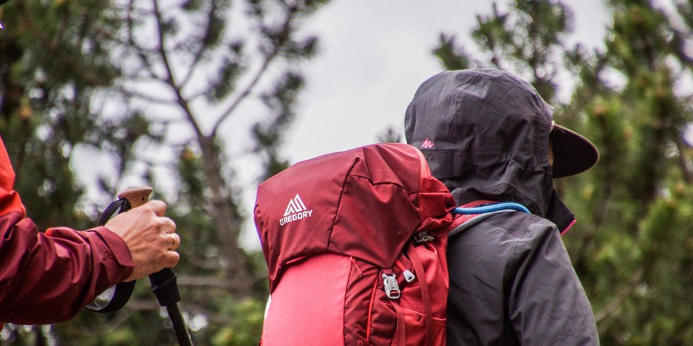 Hiker with branded gear