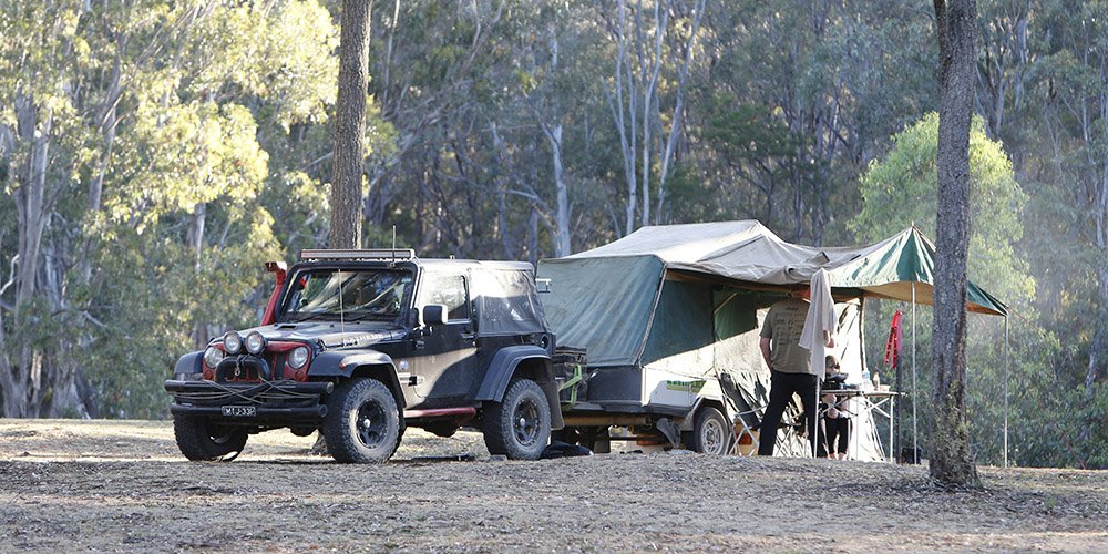 Jeep camping with trailer